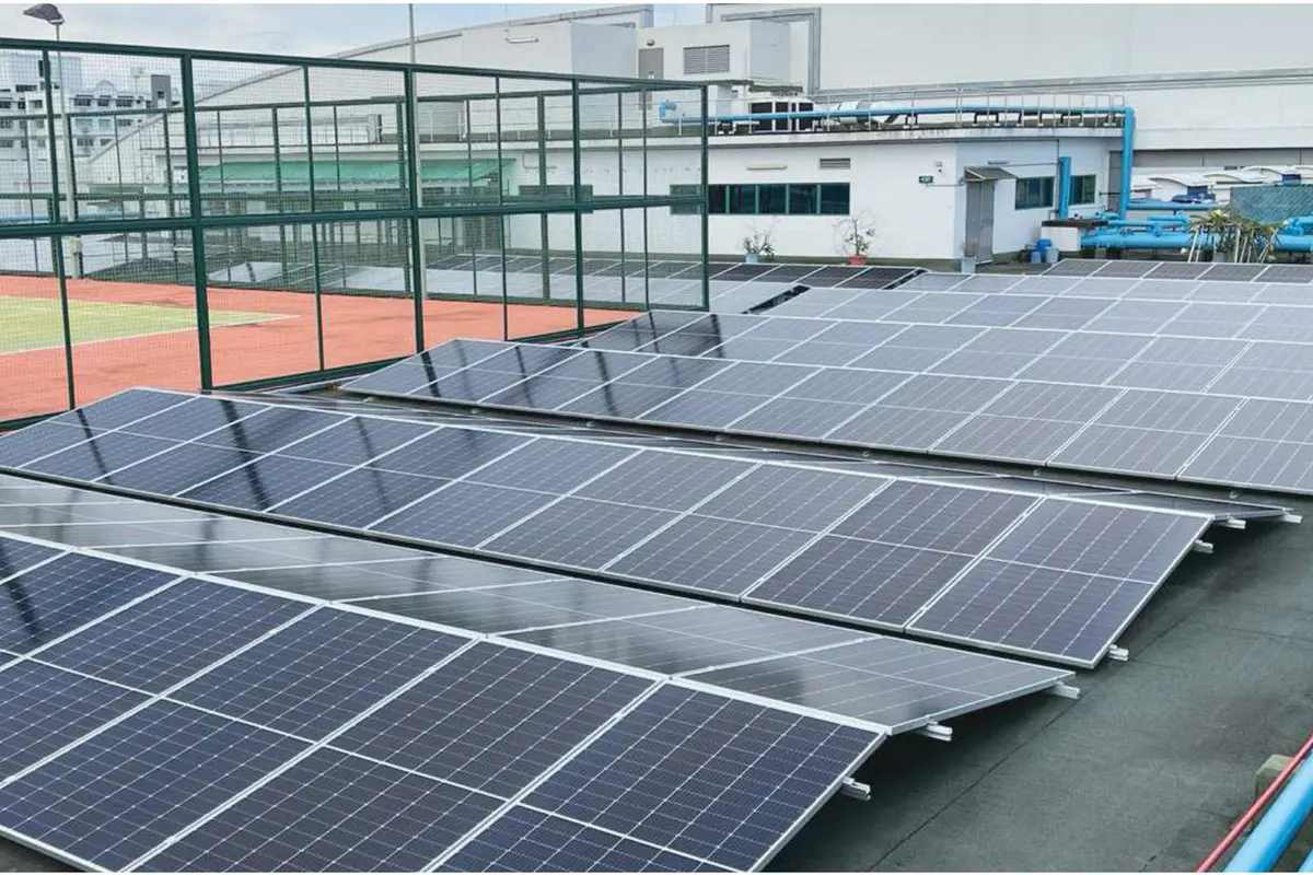 Nova TRIPOD tripod mounting system installed in tilted rows on a commercial rooftop